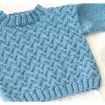 Cuddly Cable Baby Sweater Free Knitting Pattern